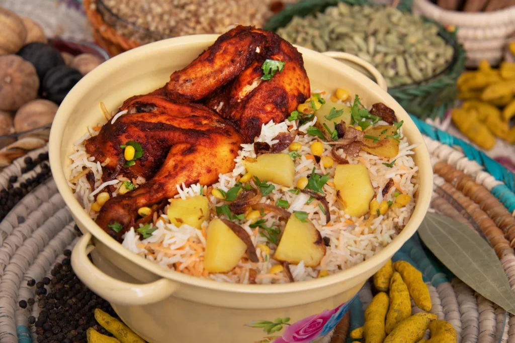 Plate of Arabic chicken biryani with spices in Riyadh restaurant.