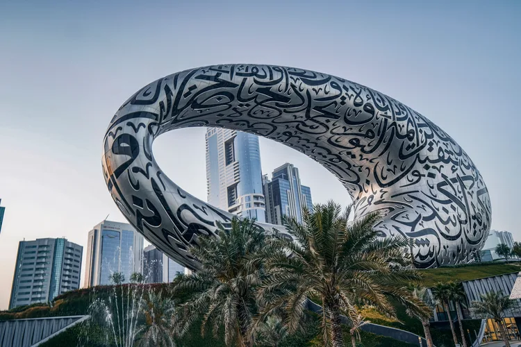 Futuristic Museum of the Future building with Arabic script in Dubai.