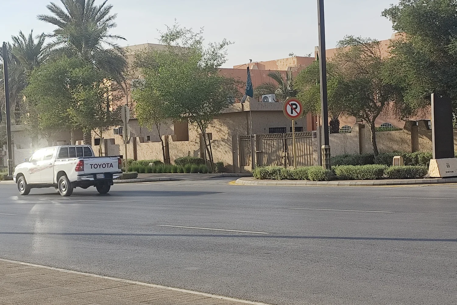 City street scene in Riyadh with buildings and a white truck.
