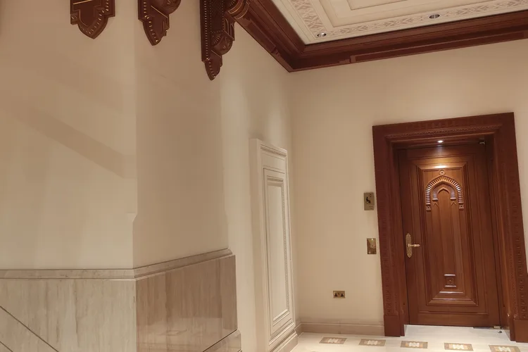 Elegant wood and marble interior of the Royal Opera House in Muscat, Oman.