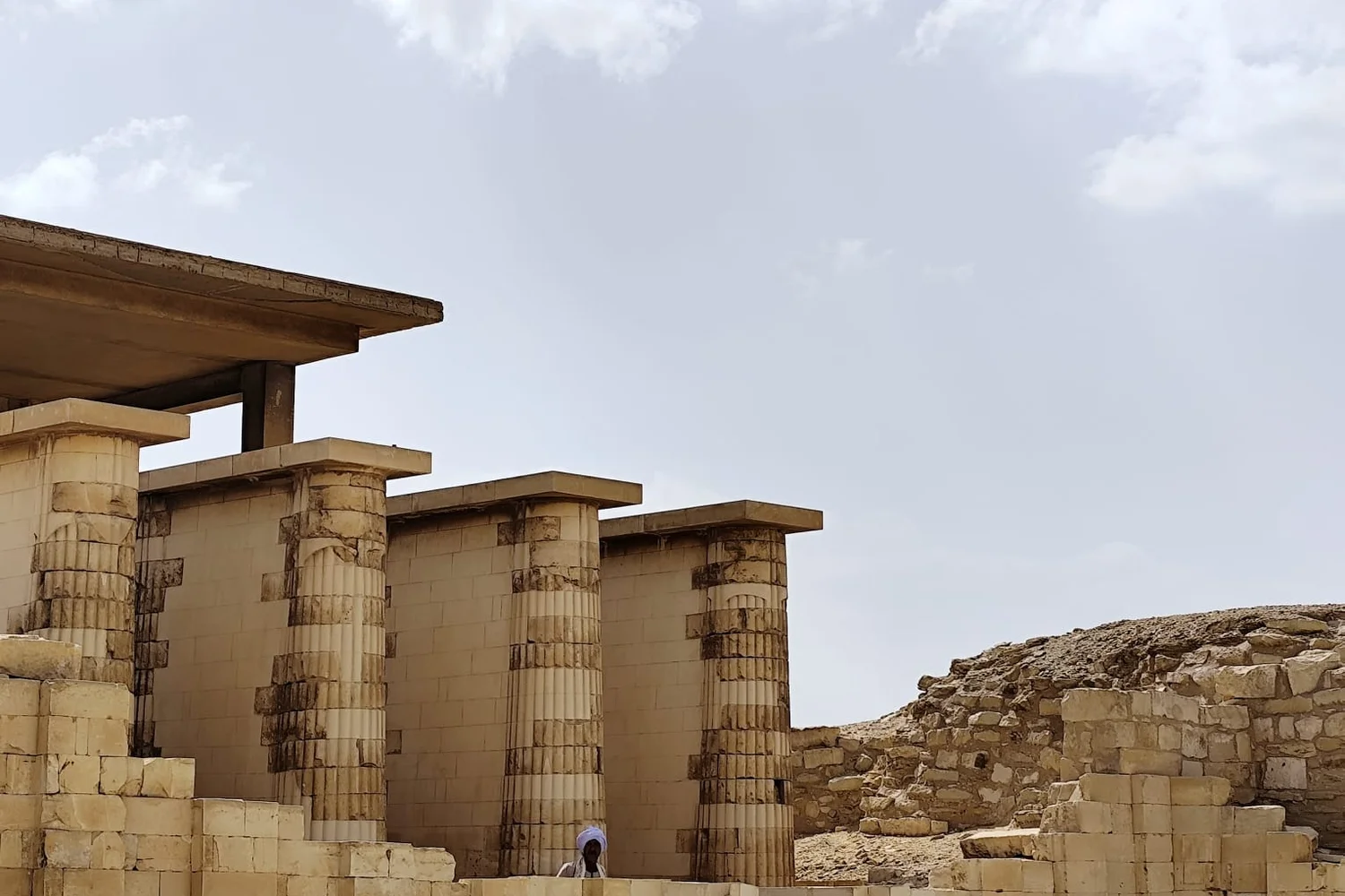 Entrance of the Saqqara Step Pyramid in Egypt on a sunny day.