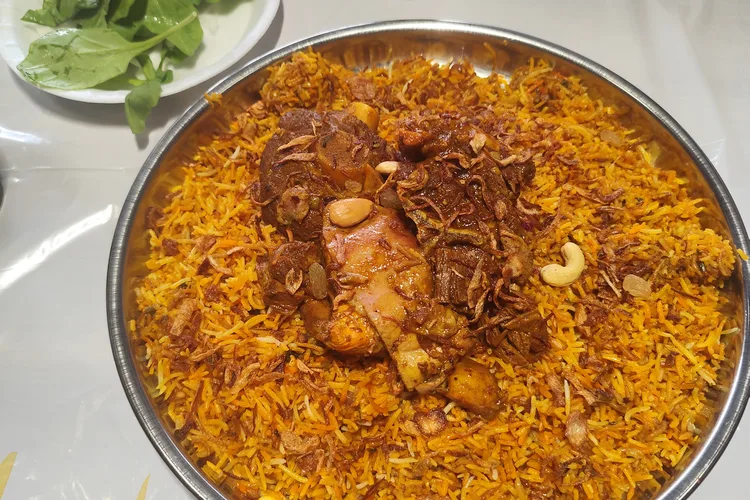 Traditional Omani spiced rice and meat dish called mandi.