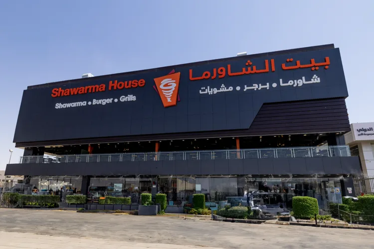 Exterior of Shawarma House restaurant in Riyadh, showing its large sign.