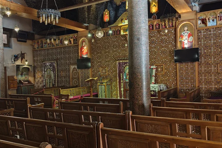 Interior of the Church of Saints Sergius and Bacchus in Cairo with ornate decorations.