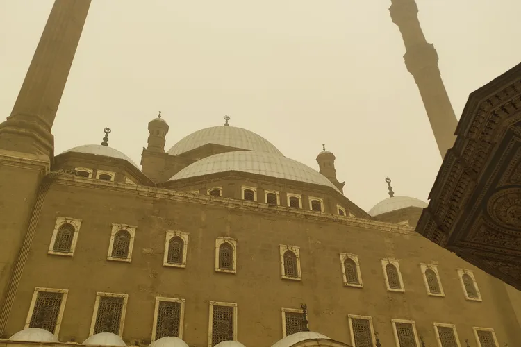 The facade of the Mohammed Ali Mosque with its domes and minaret in Cairo.